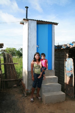 <p>Mom and son near a latrine in Bolivia. Photo by W.Oswald</p>
